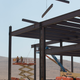 Support beams are lowered in to position during the construction of the new Tesla Motors Inc., Gigafactory, Tuesday, July 26, 2016, in Sparks, Nev. It's Tesla Motors biggest bet yet: a massive, $5 billion factory in the Nevada desert that could almost double the world's production of lithium-ion batteries by 2018. (AP Photo/Rich Pedroncelli)